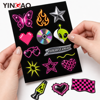 Feuille d'autocollants personnalisés découpés à la forme, effet néon brillant, motifs Alien, Papillon, Flamme, en vinyle imperméable, pour coques de téléphone, écouteurs et logos