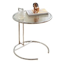 Table basse simple et moderne avec plateau en verre réglable et support en métal