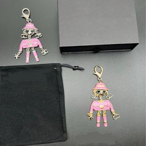 พวงกุญแจโลหะสังกะสีอัลลอยสำหรับตกแต่งกระเป๋าจี้ดีไซน์หุ่นยนต์หรูหรา - Product Image 4