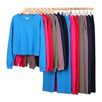 Ensemble de sport respirant en maille unie à col rond, comprenant un pull court et un pantalon de survêtement, à manches longues et coupe ample, pour le yoga, pour femme