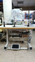 Machine à coudre industrielle Jukis MH 486-5 Singer Needle Double Chainstitch Bottom and Variable Top-feed d'occasion