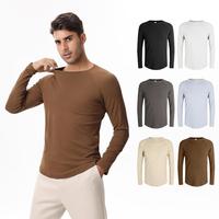 T-shirt de sport respirant et écologique à manches longues pour homme, coupe classique, en coton et élasthanne, séchage rapide, idéal pour l'entraînement et comme sous-vêtement technique.