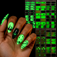 Enveloppes d'ongles en gel semi-durci non toxiques, personnalisées, à effet néon vert Halloween, motif visage de fantôme brodé et paillettes noires effet goutte, pour fête d'horreur