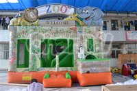 Structure gonflable commerciale en PVC sur le thème du zoo animalier, avec toboggan et château rebondissant pour enfants