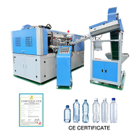 Machine de soufflage de bouteilles d'eau 4 cavités 2L PET 5500 BPH Moteur servo 50kW Faible consommation d'énergie Solution clé en main Moule personnalisable