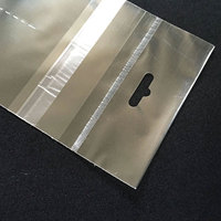 Sac Opp Cpp Transparent de vente chaude avec en-tête Bopp oléofuge perforé pour la manipulation de Surface d'impression par gravure cadeau