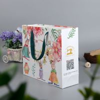 Sacs en papier personnalisés noirs de luxe pour vêtements avec votre propre logo, poignées, sacs promotionnels de vente au détail, sacs cadeaux en papier pour emballage