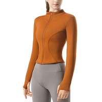 Veste de yoga zippée doublée polaire la plus vendue pour femme – Haut de sport ajusté pour la course et l'entraînement avec doublure thermique et trous pour les pouces