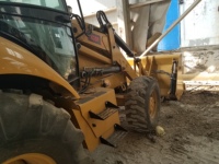 Chargeuse-pelleteuse Caterpillar CAT420F d'occasion, en état de marche et avec de bonnes performances