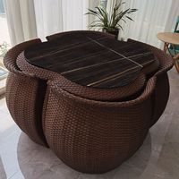 Ensemble de salle à manger d'extérieur au design moderne et peu encombrant avec structure en aluminium thermolaqué, chaise et table en rotin PE pour salon de villa