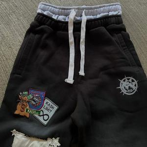 กางเกงวอร์มทรงขาบานสไตล์วินเทจ ลวดลายปักแบบดิสเทรส พิมพ์ลายสกรีน ล้างสีแบบแอซิดวอช สำหรับผู้ชาย - Product Image 3