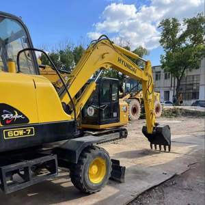 Mini-excavatrice sur pneus Hyundai 60 6T d'occasion à haute efficacité, certification CE EPA, attache rapide, brise-roche, pompe hydraulique KYB - Product Image 1