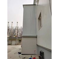 Monte-charge vertical hydraulique pour entrepôt industriel