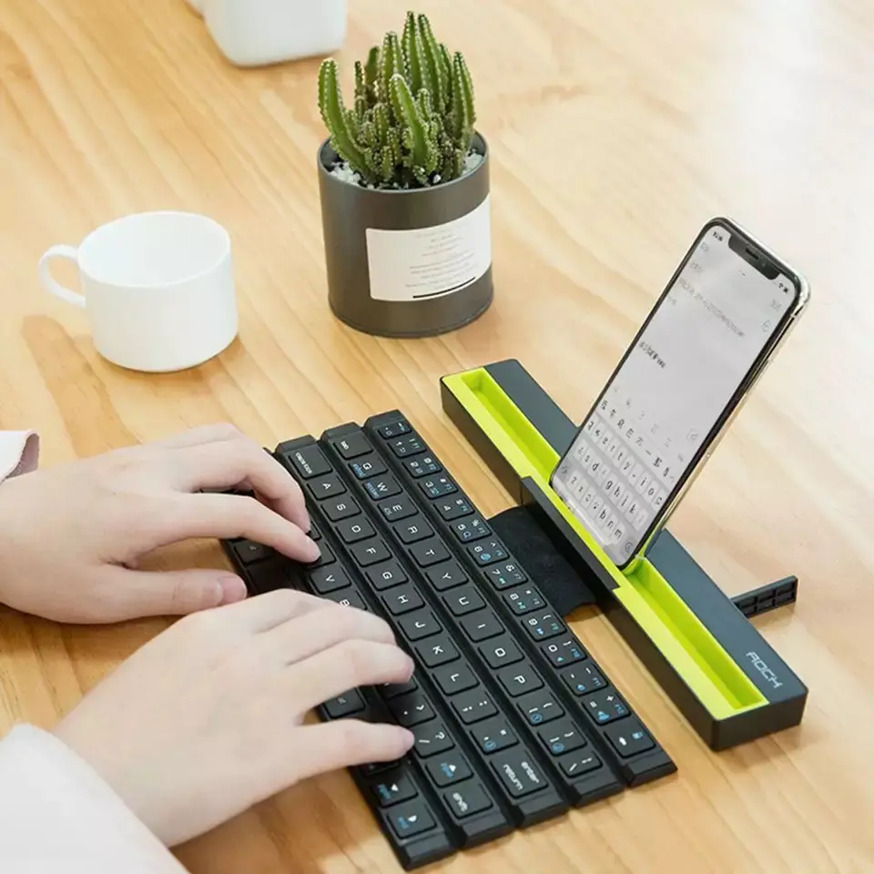 Hot sale portable foldable roll up mini wireless keyboard with holder for laptop tablet PC smart phone