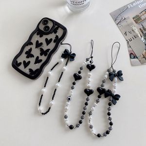 Lanière mobile de perle d'arc de papillon de coeur d'étoile cordon suspendu à la main perlé à la mode <span class=keywords><strong>chaîne</strong></span> de <span class=keywords><strong>téléphone</strong></span> unique pour l'appareil mobile - Product Image 1