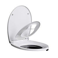 Abattant de toilettes moderne 2-en-1 en plastique avec fermeture douce et réglage de la pression de l'eau pour l'apprentissage des enfants et de la famille