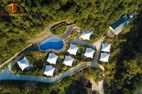 Forêt montagne lac neige modulaire isolé spa maison hébergement mobile doute toit vacances retraite tente motel hôtel cabine