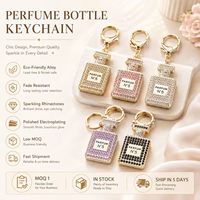 Listo para Enviar: Llavero de Metal Chapado en Oro con Forma de Botella de Perfume de Lujo 3D Eminent y Cristales de Estrás Brillantes