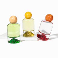 Flacon pulvérisateur en verre rond de luxe vide de haute qualité avec logo personnalisé, 30 ml, 100 ml, flacon de parfum de 50 ml avec bouchon à bille et boîte d'emballage