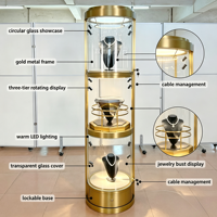 Vitrine rotative ronde en métal doré pour bijoux, présentoir en verre verrouillable à 3 niveaux avec éclairage LED pour la vente au détail de bijoux et de montres