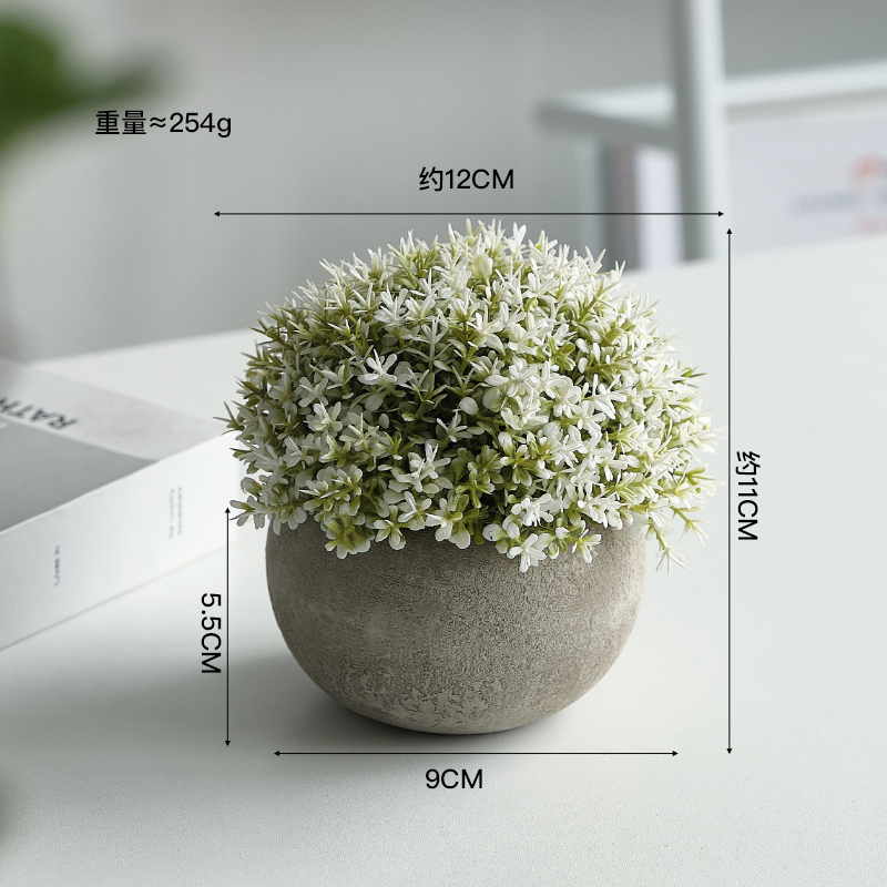 Bouteille ronde grise avec petites fleurs blanches