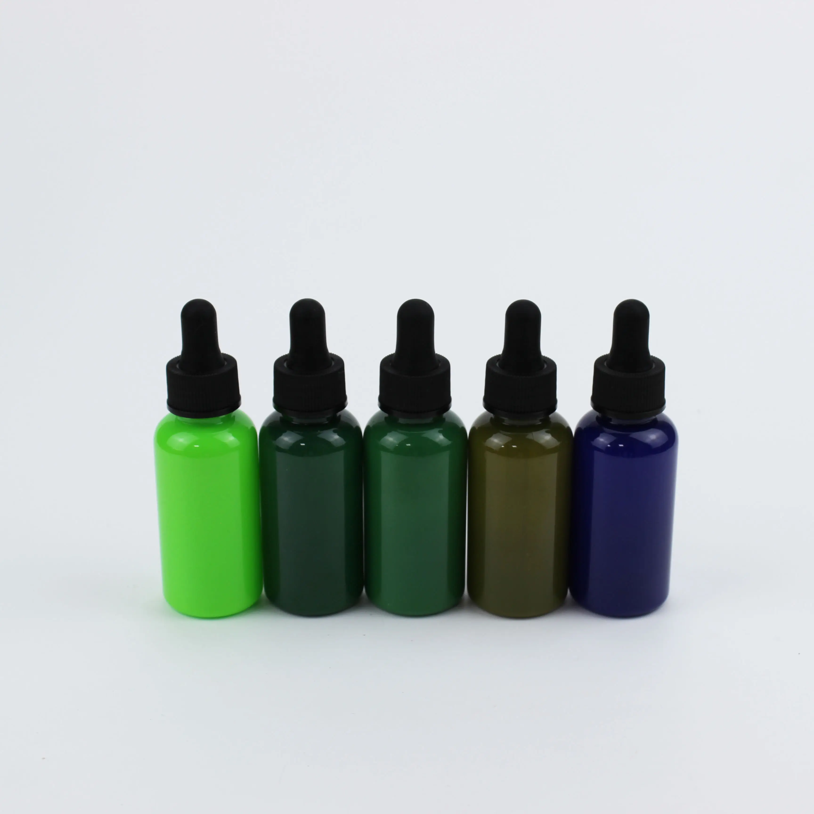 लोकप्रिय डिजाइन 60ml नीले, हरे प्लास्टिक 20mm प्लास्टिक ड्रॉपर टोपी के साथ आवश्यक तेल की बोतल