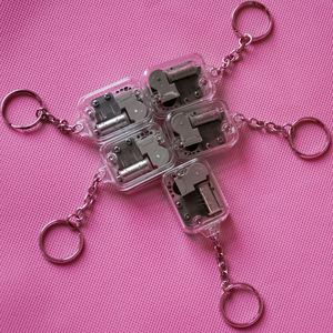 Collier pendentif boîte à musique, cadeau créatif, porte-clés en acrylique, mini porte-clés musical rotatif Château dans le ciel - Product Image 1