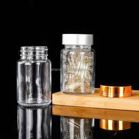 En stock 60ml 100ml 200ml 60cc 100cc 200cc bouteille de capsule de supplément de pilule en verre dépoli transparent avec couvercle en aluminium joint de sécurité