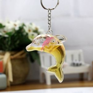 Porte-clés Dauphin Mignon avec Liquide Flottant, Pendentif Baleine Océanique Adorable, Accessoire de Sac pour Femme, Porte-clés de Voiture - Product Image 5