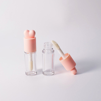 Vente en gros de tubes à gloss à lèvres vides Yunshan YS, diamètre 18 mm, couvercle en forme de cœur rose, plastique transparent épaissi, imprimé à l'écran