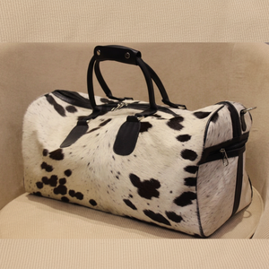 กระเป๋าเดินทางหนังวัวแท้ 100% คุณภาพสูง พร้อมล้อ ซิปปิด ขนาดใหญ่ จุของได้เยอะ ทนทาน เหมาะสำหรับเดินทาง ท่องเที่ยว กีฬา พักค้างคืน หรือใช้เป็นกระเป๋าสัมภาระสุดสัปดาห์ ปรับแต่งได้ - Product Image 1