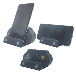 Support de téléphone en mousse PU anti-stress en gros, design manette de jeu fantaisie pour enfants de 5 à 7 ans, unisexe - Product Image 1