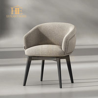 Chaise de salle à manger moderne au design moderne et luxueux Chaise longue à bras en tissu de haute qualité pour meubles de maison d'hôtel