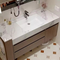 Nouvelle combinaison d'armoires de salle de bain de style moderne, style chinois nouveau, style médiéval, avec lavabo en céramique sans joint en plaque de roche
