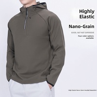 Sweat à capuche demi-zip pour homme en tissu nano-grid ultra-extensible, personnalisable avec logo, idéal pour l'entraînement sportif en extérieur et la gym, vente en gros