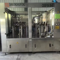 Ligne de production automatique de boissons, équipement complet de remplissage et d'embouteillage pour l'eau, les jus, les boissons gazeuses en canettes et en plastique