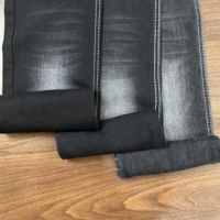 Combinaison en jean pour femme Lizhi XH6071W, tissu en jean uni extensible noir brut, fabricant de rouleaux de tissu en jean en Chine