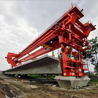 Lanceur de poutres de pont monté sur rail, capacité de 900 tonnes, chariot électrique, moteur/boîte de vitesses/roulement/moteur pour l'installation de poutres lourdes