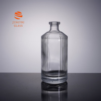Bouteilles en verre cylindriques personnalisables de 500 ml, 700 ml et 750 ml avec des rainures verticales, idéales pour les cadeaux et l'artisanat