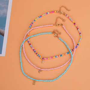 Collar <span class=keywords><strong>de</strong></span> cadena <span class=keywords><strong>de</strong></span> moda con colgante <span class=keywords><strong>de</strong></span> <span class=keywords><strong>pentagrama</strong></span> y luna <span class=keywords><strong>de</strong></span> aleación y cuentas <span class=keywords><strong>de</strong></span> semillas, joyería para mujer al por mayor - Product Image 1