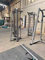 Machine d'entraînement multifonctionnelle haut de gamme à câbles croisés, à charge libre, pour salle de sport commerciale sur mesure