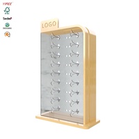Support en bois de chêne de magasin d'optique avec logo personnalisé tenant 18 paires de lunettes de soleil vitrine de comptoir