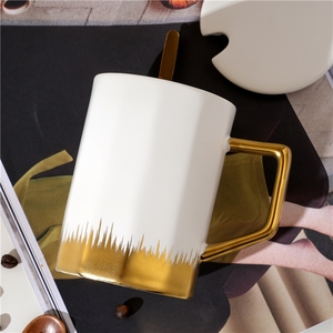 Manufacturer Selling Minimalist Style <b>Ceramic</b> <b>Cup</b> <b>Ceramic</b> Mug with Gold Handle with a Porcelain Lid and a Golden Spoon - Product Image 4