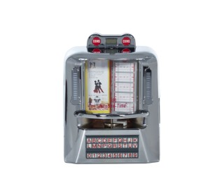 Mini Reproductor de Música con Radio FM, USB/SD/BT/AUX IN/LINE OUT, Altavoces de 2+2W, Control <span class=keywords><strong>Remoto</strong></span>, Color Plateado Metálico - Product Image 1