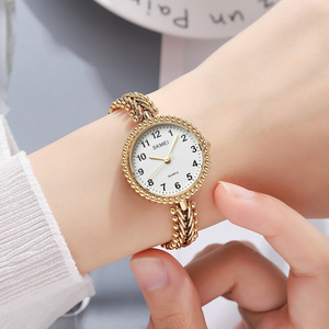 Reloj de cuarzo SKMEI para mujer, pulsera de aleación, esfera redonda, pantalla analógica, reloj elegante de moda, banda de cobre de 30mm de diámetro - Product Image 1