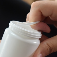 Flacon en plastique HDPE blanc de 150ml pour capsule de pilules de médecine orale solide avec double bouchon bouchon à vis de haute qualité