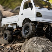 Voiture RC 4x4 Mini Pick-up 2,4 GHz Télécommandée Kei Truck Tout-Terrain Blanc ABS+Métal Lumières LED Échelle 1:10 Prête à l'emploi Chargeur Inclus
