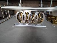 Table à manger de luxe avec cadre en métal en acier inoxydable et marbre