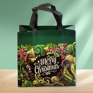 Bolsa de Regalo Navideña de Tela No Tejida Laminada de 30x30x15cm con Impresión por Transferencia de Calor y Logotipo Personalizado - Product Image 1