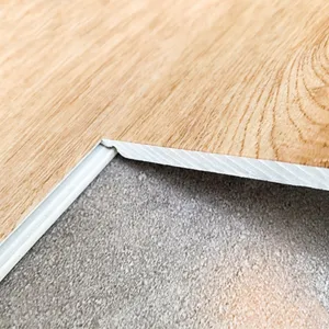 Revêtement de sol SPC imbriqué en plastique pvc imperméable 4mm Matériau vierge en vinyle Noyau rigide en marbre Plancher hybride SPC Plancher clic